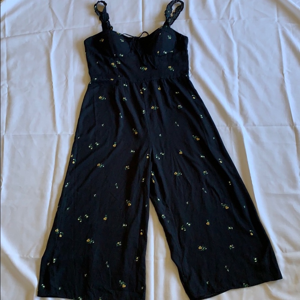 Black floral jumpsuit with ruffled straps